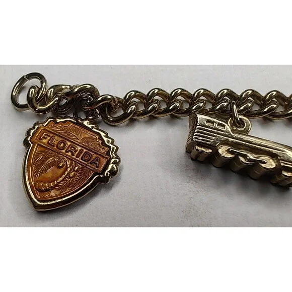 Vintage Gold Tone Charm Bracelet Airplane Cruise Ship Train Engine Florida Cross - Picture 9 of 13